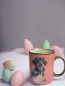 Preview: Tasse altrosa mit Osterdackelmotiv Rauhi