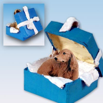Weihnachtsbaumanhänger in blauer Geschenkbox