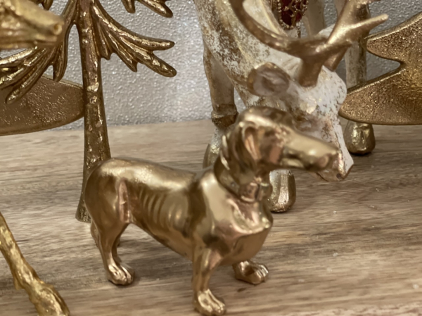 kleiner goldener Dackel in zwei Ausführungen